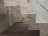 Лестница на металлическом каркасе в облицовке из дуба — фото 2